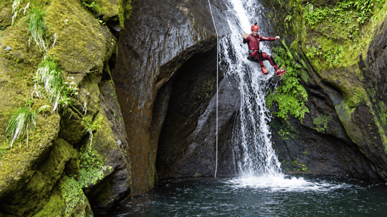 Rappelling during a canyoning tour in Madeira